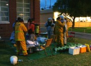 Crews prepare protective clothing for chemical spill clean up, Roseworthy