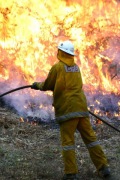 A firefighter at a burn off at Cleland