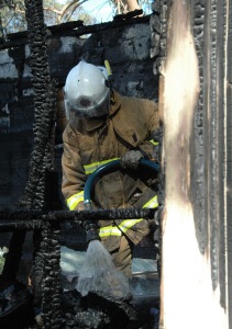 Extinguishing the last of a house fire