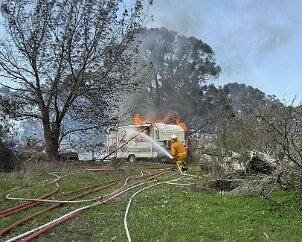 Wood pile and caravan fire, Totness from Littlehampton CFS