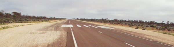 A remote airstrip on a main highway